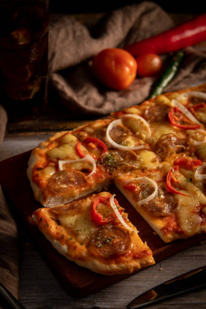 istock pizza on a wooden board 1597127562