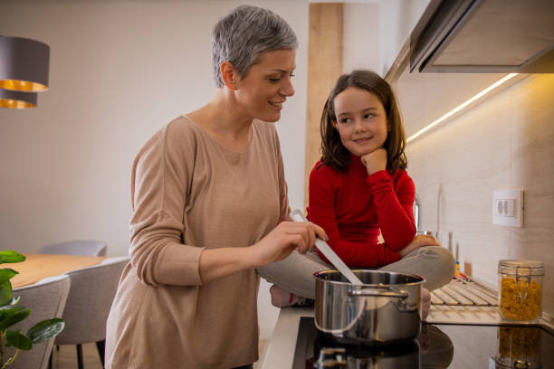 istock Mother and daughter bonding together 1597359275