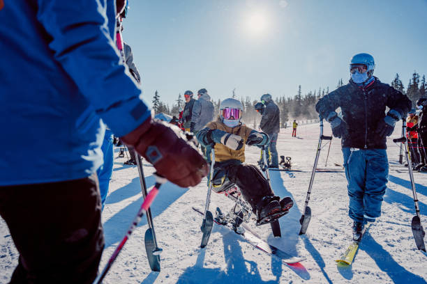 istock Friends spending time together between ski runs on sunny winter day 1597362995