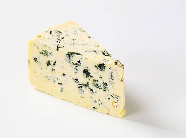 blue cheese a piece of a ripe blue cheese blue cheese stock pictures, royalty-free photos & images
