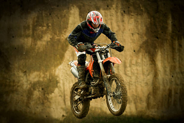 istock Motocross enduro rider jumping with motorcycle 159738439
