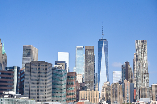 Jersey City panoramic view. Manhattan over the Hudson river with famous Freedom tower remote view.