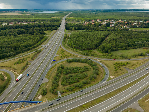 Driving on the freeway, aerial view of motorway