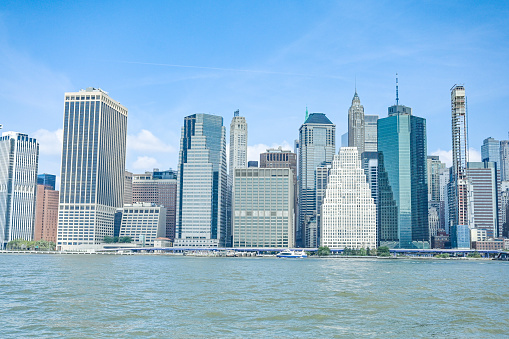 Skyline of Manhattan, New York. Downtown financial district on a clear sky day.