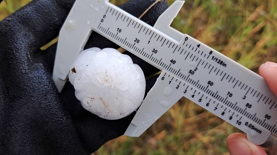 Measurement of large hail while storm chasing