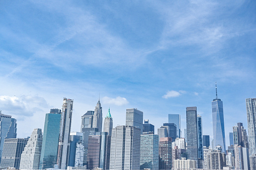 Skyline of Manhattan, New York. Downtown financial district on a clear sky day.