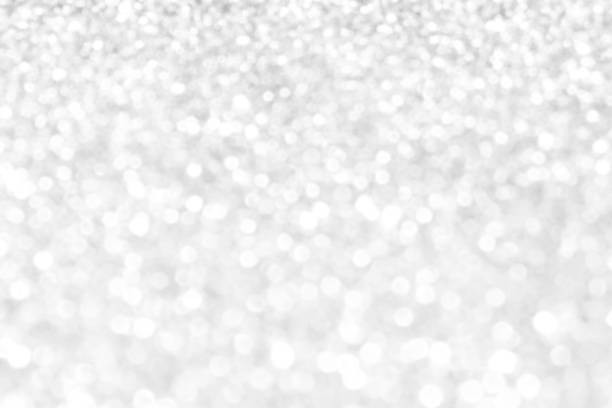istock White and gray bokeh background. Celebration background concept. 1597539496