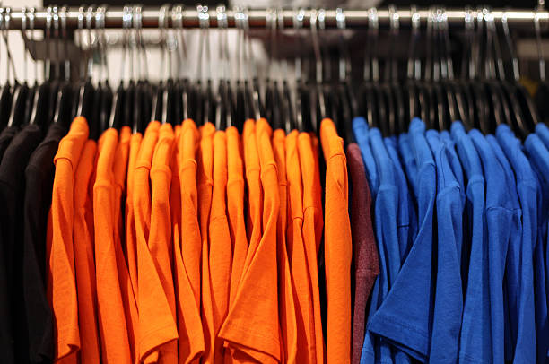 t-shirts on hangers at the show
