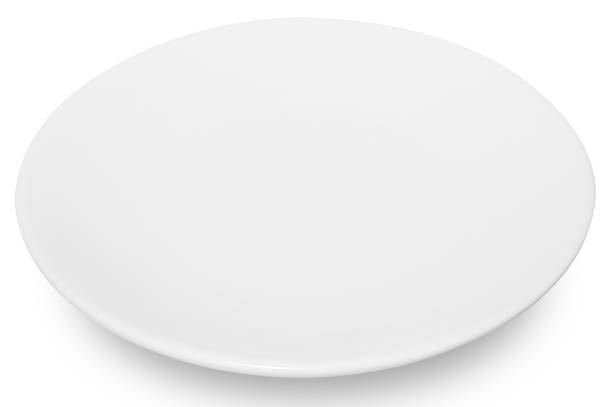 istock White circle ceramics plate isolated on white background. 1597557419