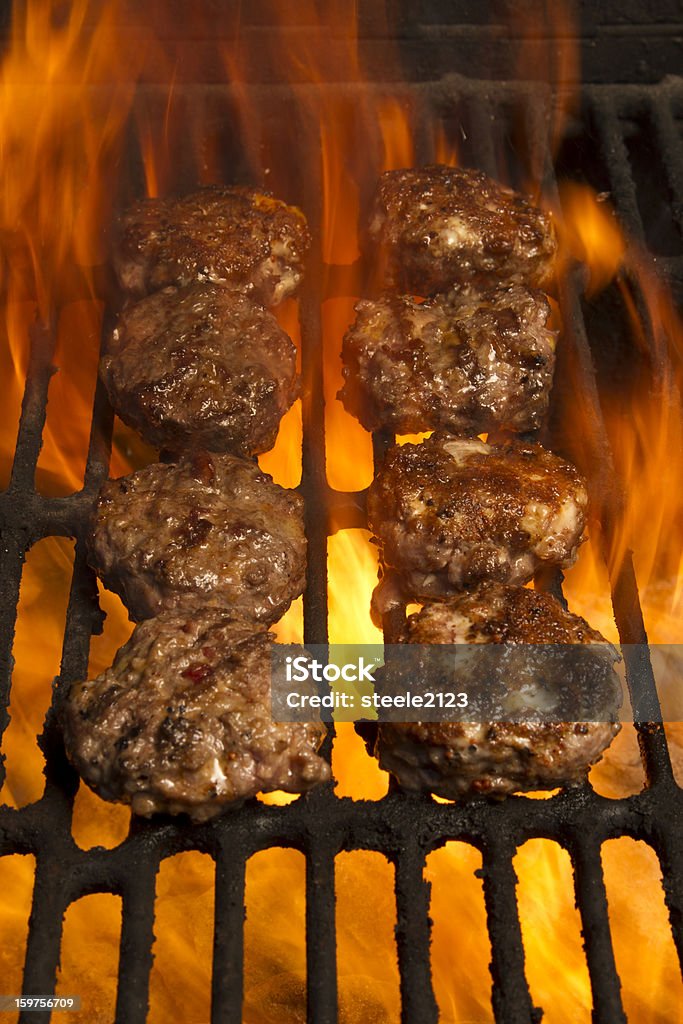 Hamburgers sur le gril - Photo de Gril libre de droits