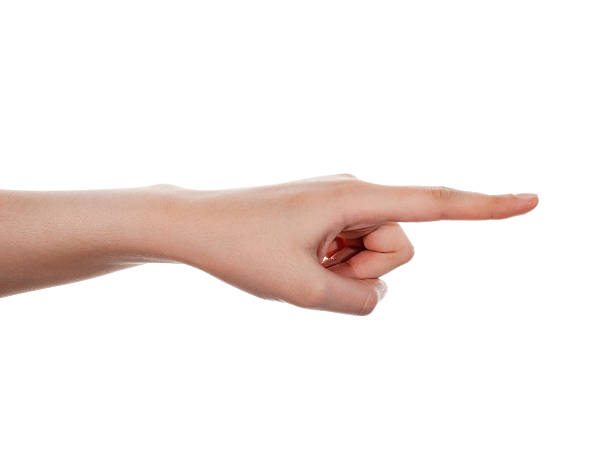 Pointing Hand Human hand pointing at something or pressing a button. Isolated on white. index finger stock pictures, royalty-free photos & images