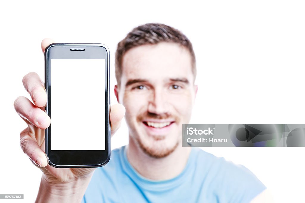 Lächelnder Mann zeigt ein Telefon - Lizenzfrei Handy Stock-Foto