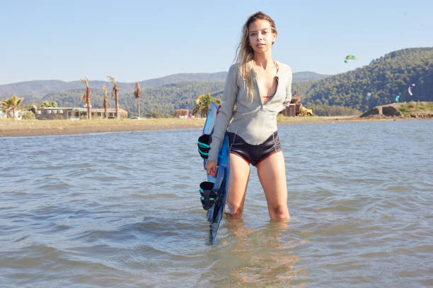 While posing with Kitesurf board after the lesson