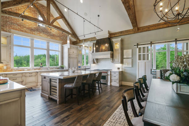 Open floor plan with dining table near kitchen and island