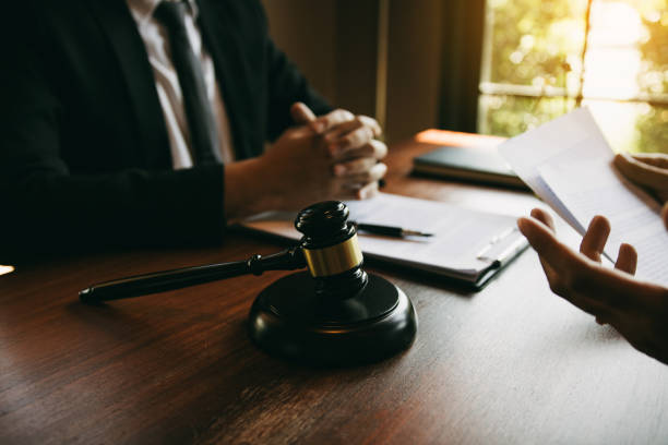 istock Client is explaining the offense to the lawyer and working together to solve the problem of the offense. 1597722050