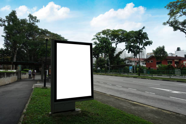 istock Blank vertical advertisement mock up at the bus stop. 1597737172
