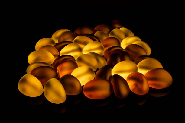 istock Transparent clear and Amber glowing on black background 1597745197