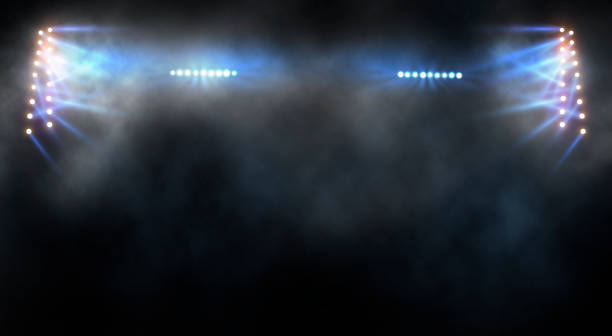 istock Bright stadium arena lights and smoke 1597754336