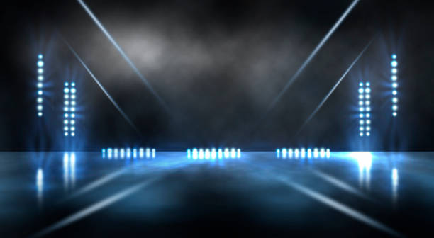 istock Bright stadium arena lights and smoke 1597764533