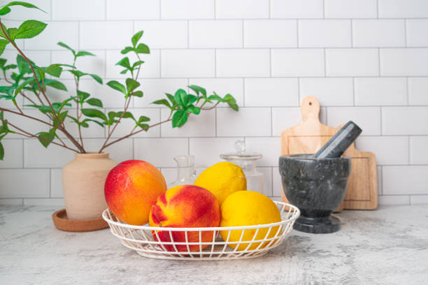 istock Lemon and nectarine fruit in kitchen table top for healthy cooking, eating, dieting and vegan concept. 1597868613