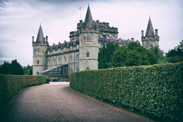 Inveraray castle Inveraray, United Kingdom- July 21, 2023: Toned photograph of Inveraray Castle, located by the Loch Fyne on the west coast of Scotland. Inveraray Castle was built in the 18th century. loch fyne stock pictures, royalty-free photos & images