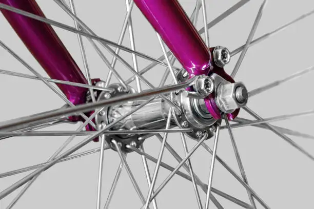 Bicycle wheel hub. Bicycle wheel. Isolated on light gray background.
