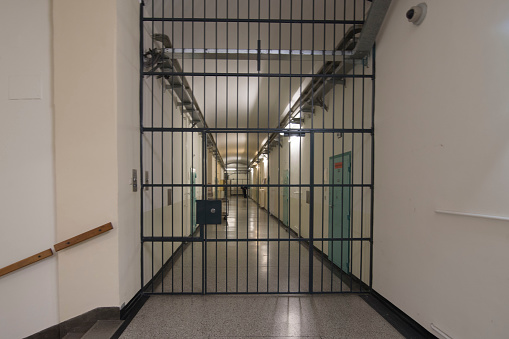 the empty corridor of a prison