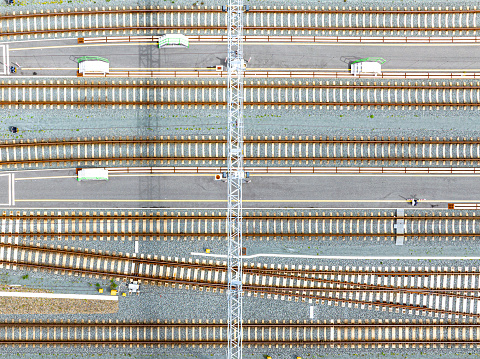 Empty railway yard seen from above. The railway tracks create an almost abstract line pattern from this high viewpoint.