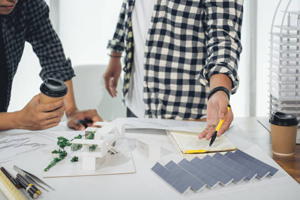 istock Engineers calculate the design of renewable energy, both wind and solar. selective focus, design concept of renewable energy, solar energy utilization, calculation, design solar installation system 1597986521