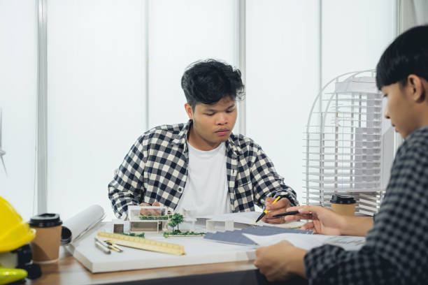 istock Engineers calculate the design of renewable energy, both wind and solar. selective focus, design concept of renewable energy, solar energy utilization, calculation, design solar installation system 1597986523