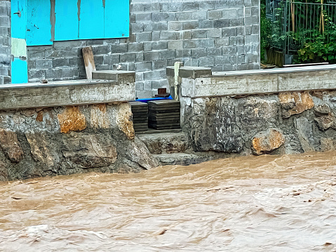 Heavily flooded riverbed of stream Mali graben at Ljubljana - Vic District. Newly built water barrier saved the district from fatal flood. Heavy rain caused the biggest flood in Slovenia in it's modern history in August 2023.