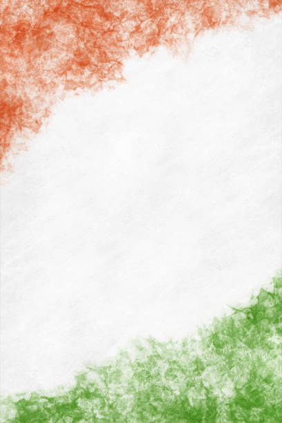 istock Vertical rustic faded weathered background with tricolor splashes, in faint smudged pastel orange or saffron, white and green colors smudged splattered in spray paint in corners as in National Flag of India 1597991934