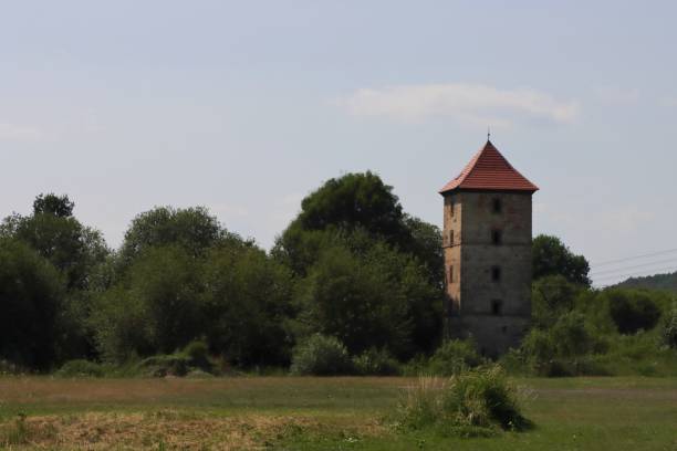 istock Nice public park garden with old buildings 1598027041
