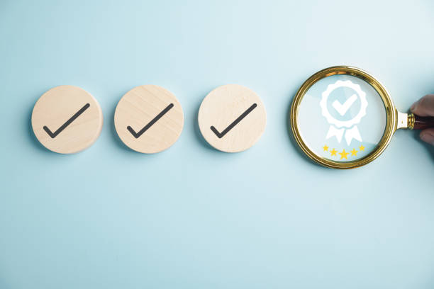 istock Certification and ISO quality concept illustrated with a magnifying glass highlighting 1598041584