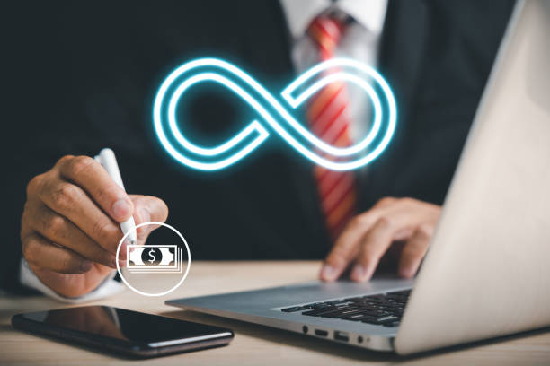 istock Businessman points to infinity symbol, representing limitless connection in data technology 1598042293