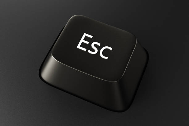 istock Black keyboard button with the word Esc on a black background. 3d rendering illustration. 1598082895