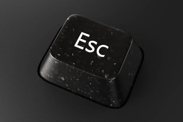 istock Black diamond keyboard button with Esc word on black background. 3d rendering illustration. 1598083961