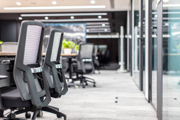 istock Empty large meeting room with neat seats 1598103457