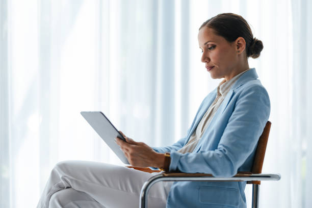 istock Businesswoman Using Digital Tablet In The Office 1598106254