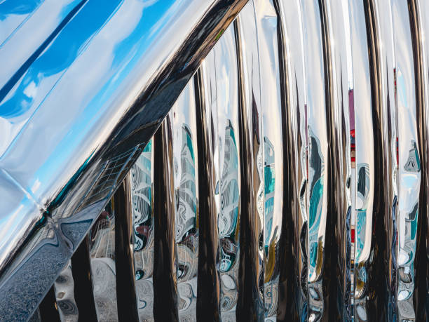 istock Abstract modern urban metal structure in a row in boomerang curved bent shape 1598129947