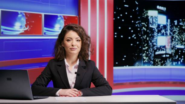 istock Reporter presenting news on night show 1598140302