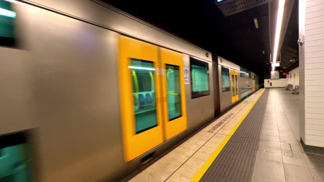 passenger Train going through suburban sydney train Station NSW Australia