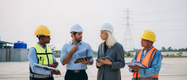istock Engineers working on solar installations to create an eco-friendly and renewable power generation. Professionals working outdoors to develop modern and sustainable solar energy solutions. 1598160461