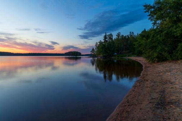 istock Tranquil scene of a beach at dusk. 1598169630