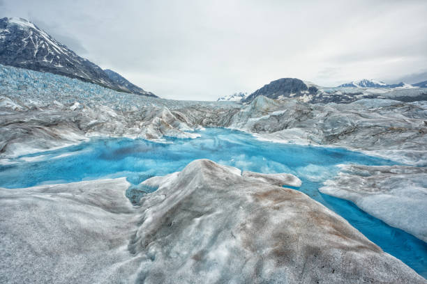 Blue lagoon at Glacier Knik in summer, Alaska, US. High quality photo