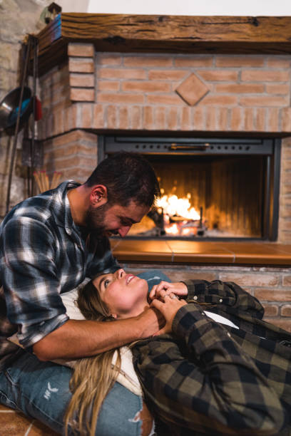 istock lovely passionate couple together at home 1598184980