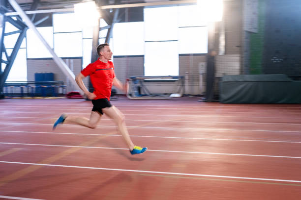 istock Athlete man running on track 1598211047