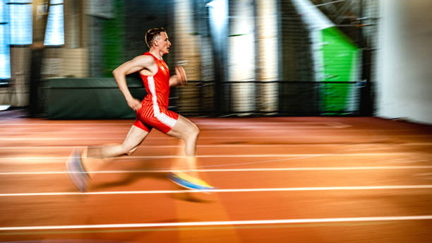 istock Athlete man running on track 1598211445
