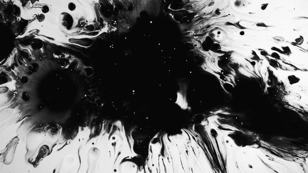 istock Ink surface oil splash black fluid stains spread 1598237278