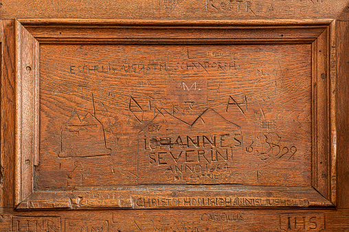 in the Middle Ages, students carved their names on old choir chairs in Sorø monastery church, Denmark, July 29, 2023